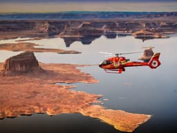 Red helicopter flying over Lake Powell from Page, Arizona